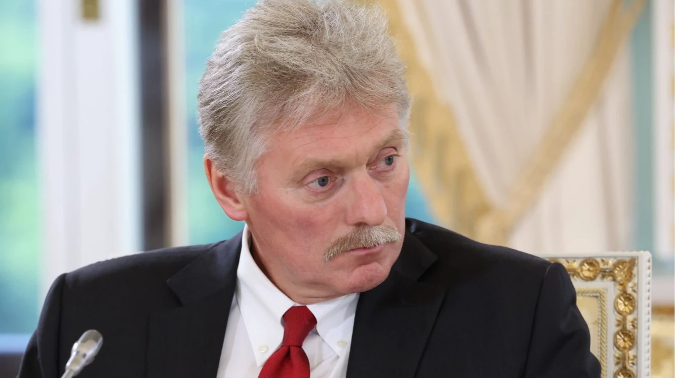 Речник Кремля Дмитро Пєсков і президент РФ Володимир Путін (фото REUTERS)